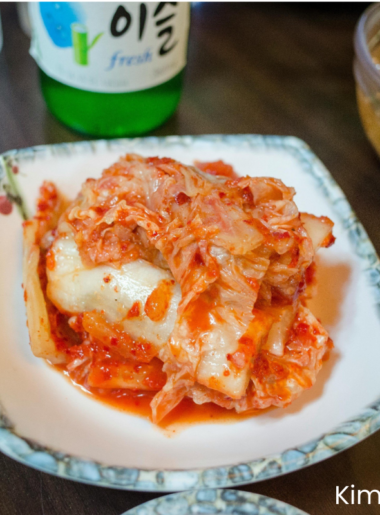 vegan kimchi in a bowl placing on wooden table