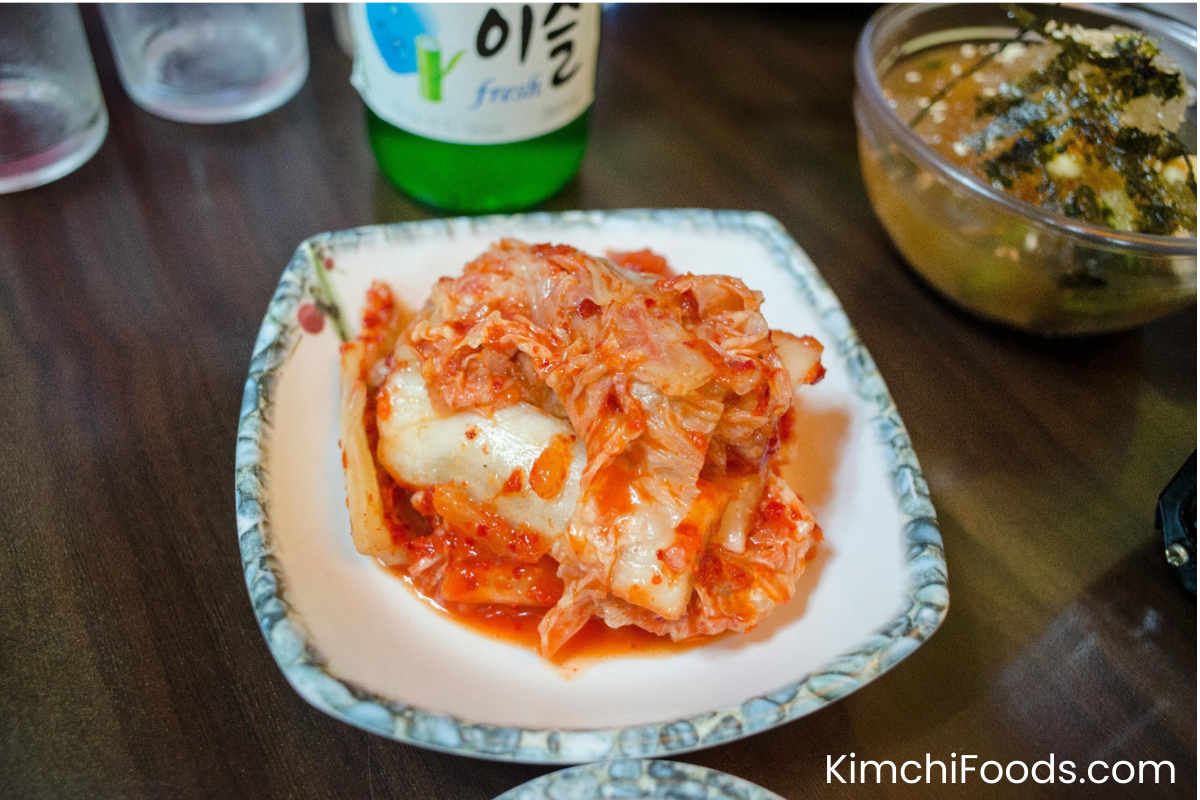 vegan kimchi in a bowl placing on wooden table